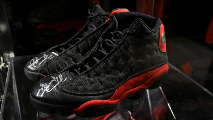 Former American Basketball player Michael Jordan sneakers fetch auction record $2.2 million