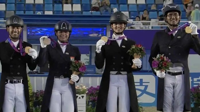 India won its third gold medal after the Equestrian team took first place on the podium in the dressage event