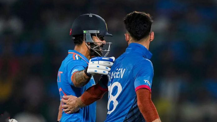 During a cricket World Cup match, Virat Kohli buries the hatchet with Naveen Ul Haq and says...