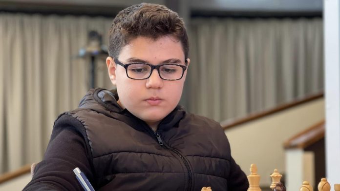 GM Erdogmus, 13, sets a new record for the youngest player to ever record a 2600 rating