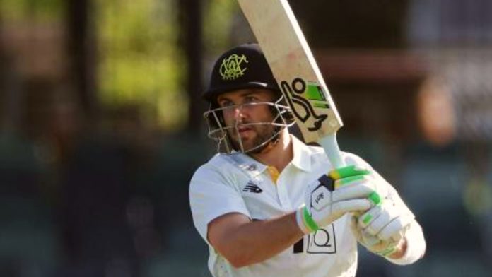 Josh Inglis reaches his century in 90 balls during his Test debut against Sri Lanka