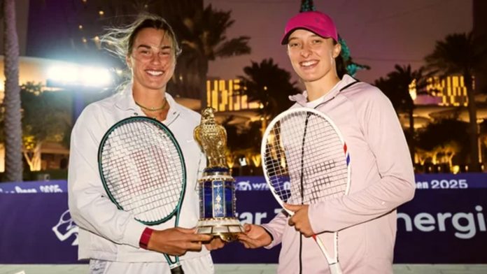 Aryna Sabalenka and Iga Swiatek have a great time together during a fun photo shoot featuring the Qatar Open 2025 trophy